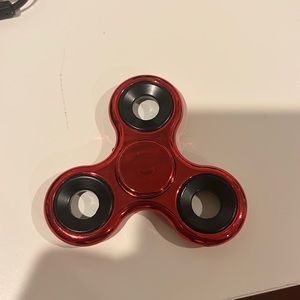 Used kids 3 inch red fidget spinner, brand (unknown)